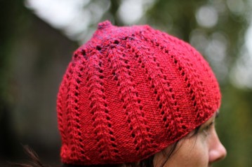 Hand knitted, bright red, wooly hat "Lingonberry"